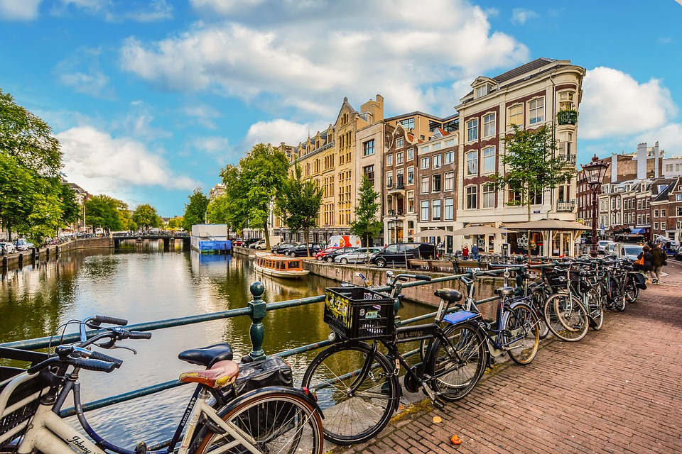 amsterdam bikes on a bridge