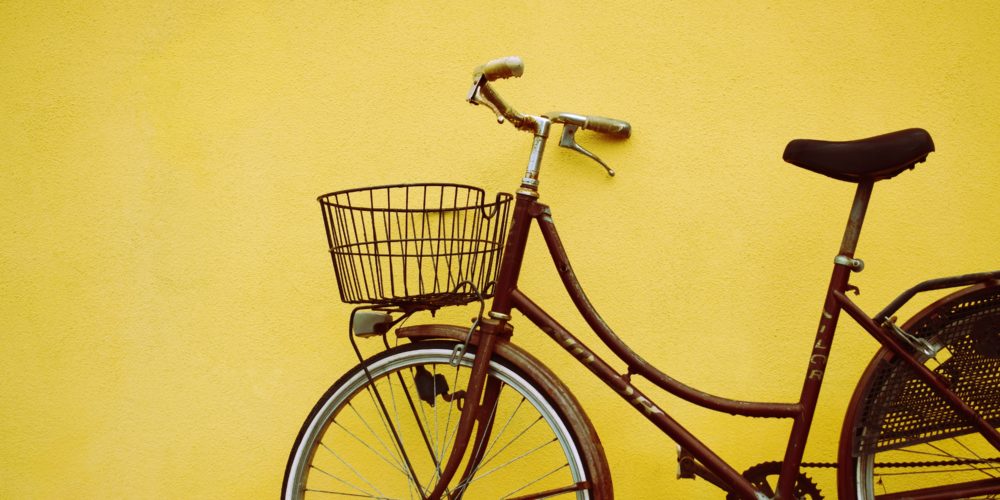 vintage bikes by wall
